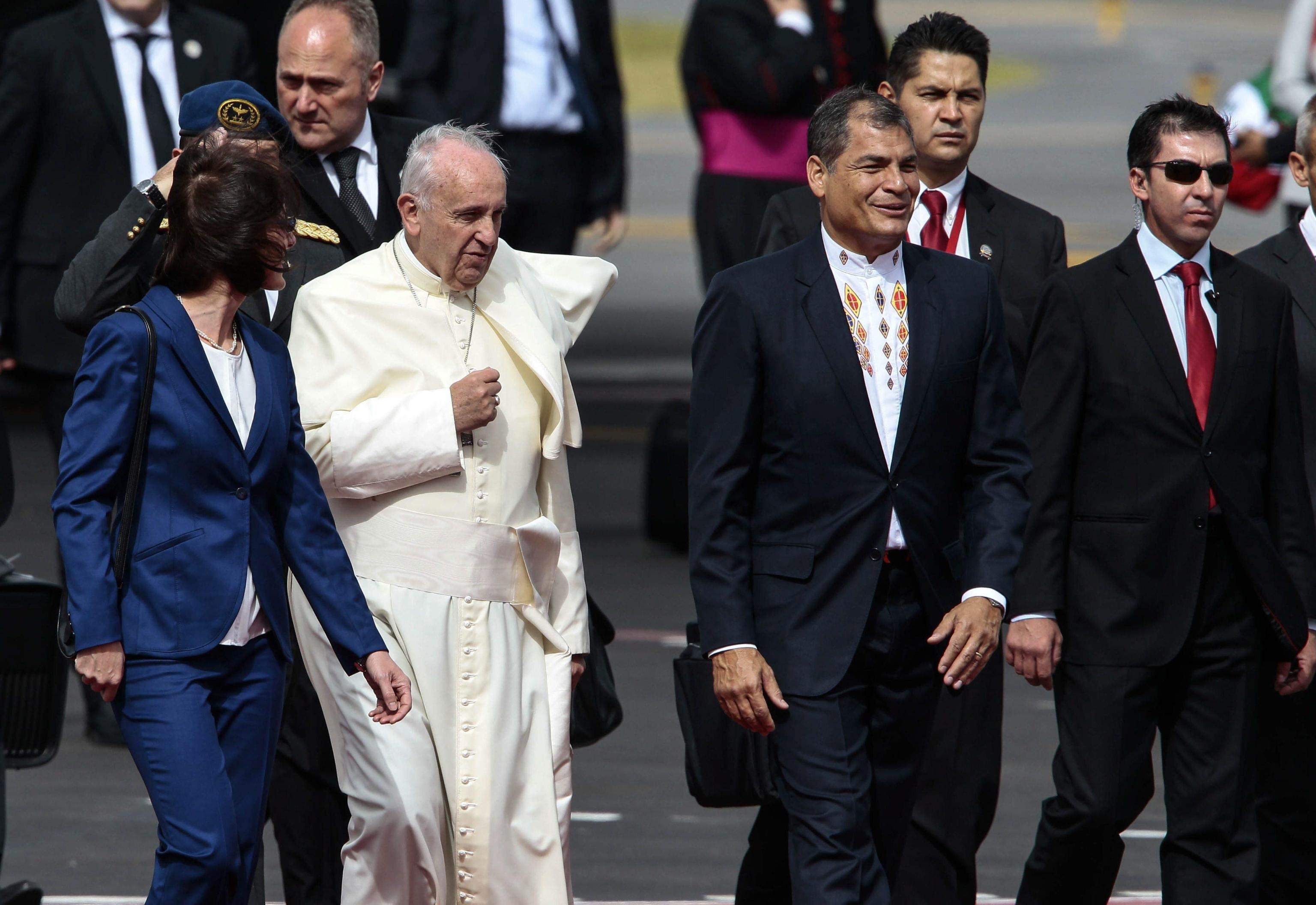 Pope Francis next to Ecuador's President Rafael Correa at his arrival at the International Airport of Quito