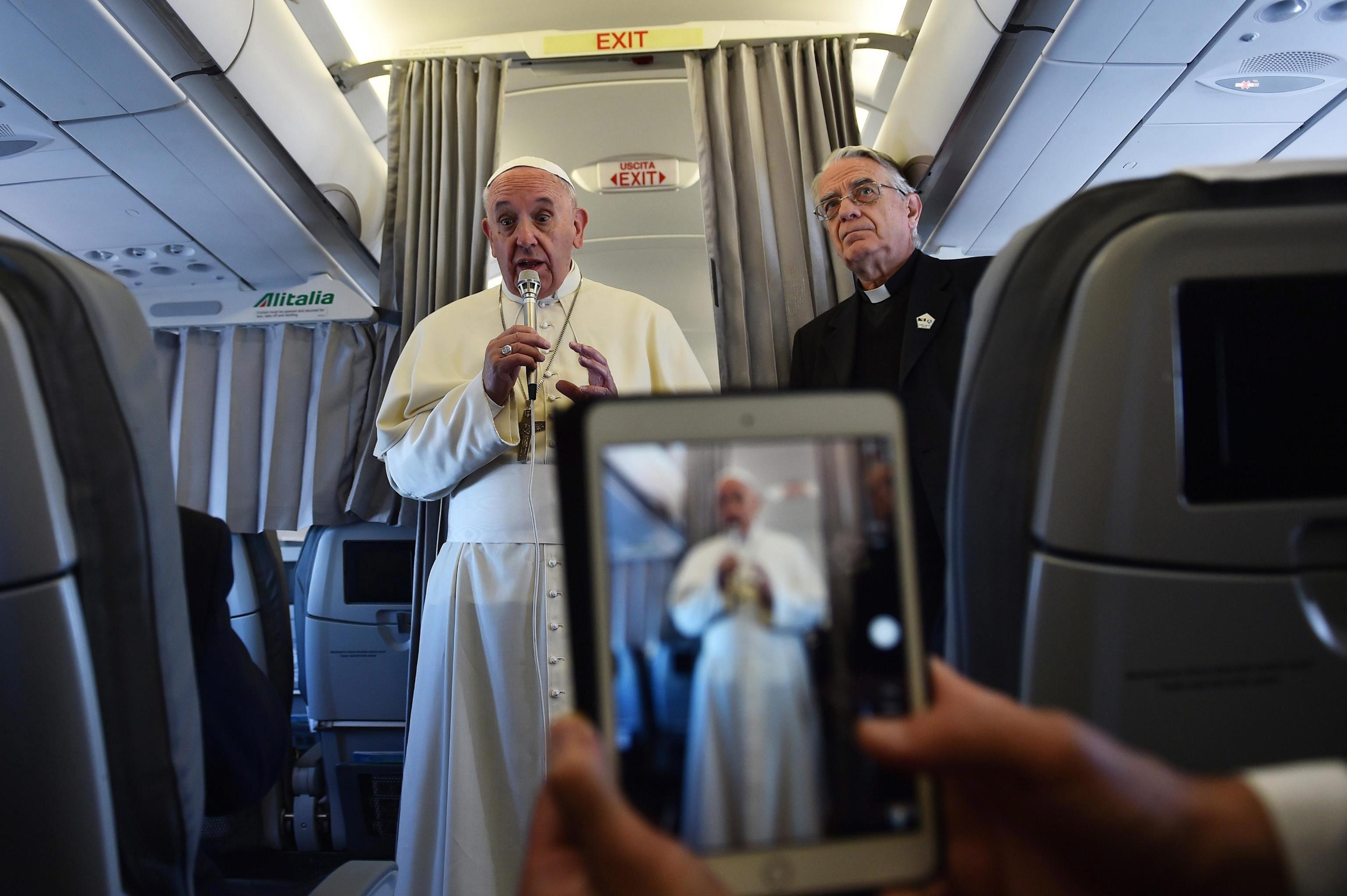 Pope Francis addresses journalists aboard the plane heading to Sarajevo